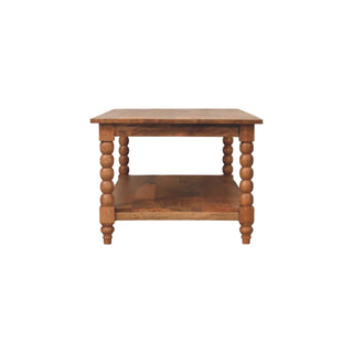 Full front elevation of the wooden coffee table with bobbin turned legs and a storage shelf.