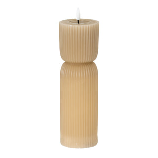 Tall, fluted natural LED candle with a carved, tapered middle section, shown front-on.