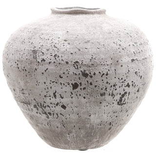 Full view of the round, stone-effect ceramic vase with mottled grey texture and a slightly wavy rim.