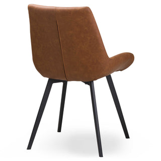 Rear view of tan faux leather dining chair showing curved backrest and black angled legs.