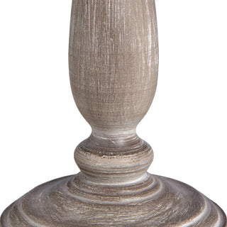 Close detail of the lamp base turning, showing the distressed wood texture and brushed grey finish.