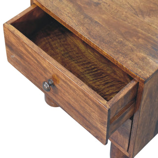 Detail view of the chestnut nightstand with the top drawer open, showing the interior and metal knob.
