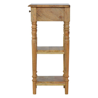 Full height narrow end view of the wooden telephone table with turned legs and two storage shelves.