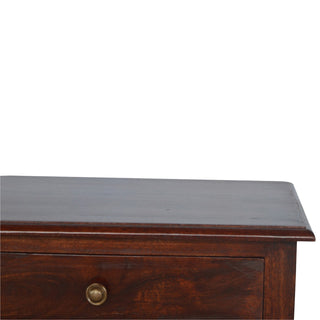 Detail shot of the occasional table showing the polished dark wood surface and brass drawer pull.