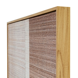 Side profile view of the canvas and light wood frame, highlighting the textured paint blocks.