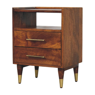 Dark mango wood bedside table showing rich grain, open shelf, two drawers, and brass hardware.