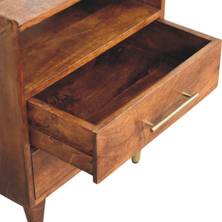 Detail showing the open top drawer and shelf, highlighting the deep mango wood grain and interior construction.