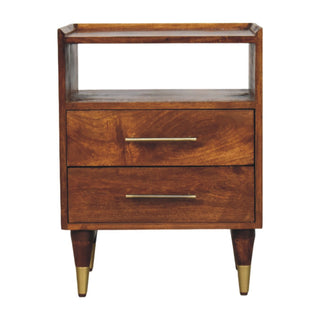 Plain front-on product shot of the bedside table. Open shelf, two drawers with brass bar handles, and tapered legs with metal tips.