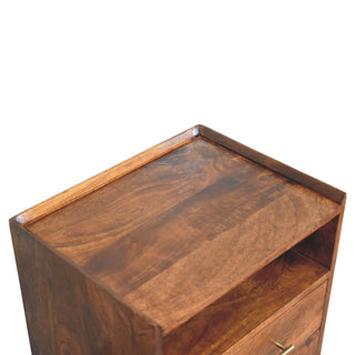 Detail of the bedside table's top surface, showing the raised edge and deep brown wood grain.