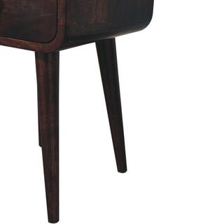 Close-up detail of the dark walnut bedside unit's base and two tapered, angled legs.