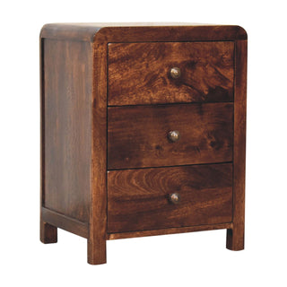Three-drawer dark walnut bedside cabinet shown from a slight angle, highlighting the rich wood grain and the rounded corners.