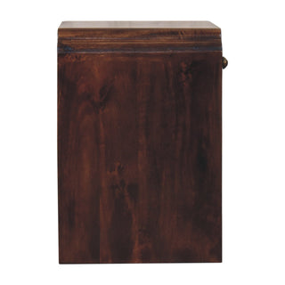 Side profile of the dark walnut bedside table, showing the depth of the unit and the curved top edge.
