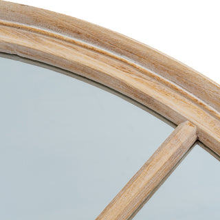 Close-up of the washed wood frame moulding and the joint where the central division meets the curved edge.