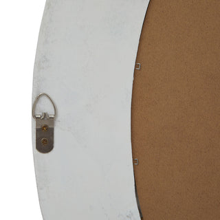 Metal D-ring hanging fixture screwed into the back of the pale washed wood mirror frame.