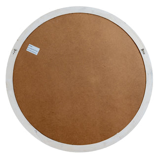 Full back view of the round washed wood mirror, showing the brown hardboard backing, warning label, and two metal hanging brackets.