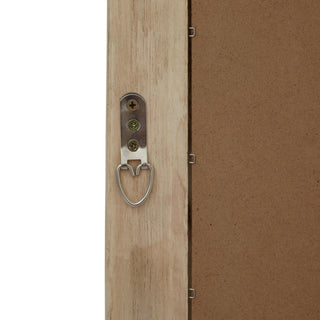 Reverse view detail showing the metal hanging loop, screws, and backing board clips.