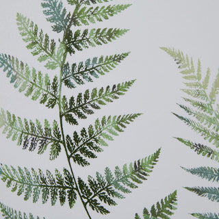 Close detail of the watercolour fern illustration, showing layered greens and textured brushstrokes on white paper.
