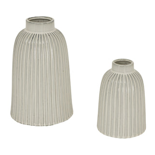 Scale comparison showing the medium white ribbed vase next to a taller matching vase.