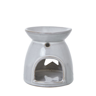 White ceramic wax melt burner showing the rustic glaze texture and brown detailing on the rims.