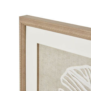 Close-up showing the light wood frame corner joint, white mount, and textured beige fabric backing.