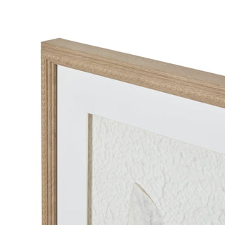 Extreme close-up of the light wooden frame corner, showing the beaded inner edge.