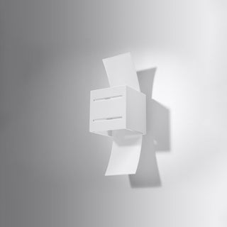 White cubic wall lamp viewed from an angle, highlighting the two front horizontal slots.