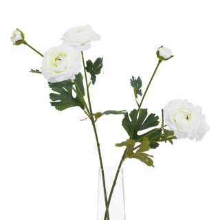Two artificial white ranunculus stems with buds and leaves, shown in a clear vase.