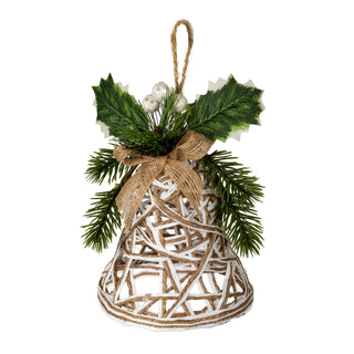 Front view of a bell decoration made of white and brown woven rattan, topped with holly, pine, and a jute bow.