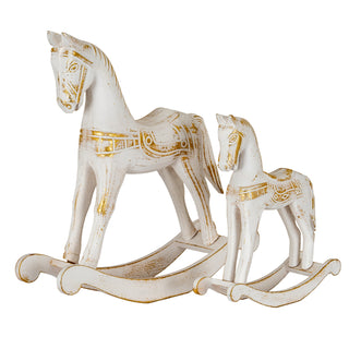 Pair of whitewashed wooden rocking horses in two sizes, decorated with distressed gold accents.