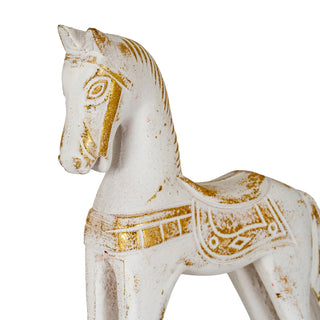 Detail shot of the rocking horse head, mane, and saddle blanket, highlighting the distressed gold paint.