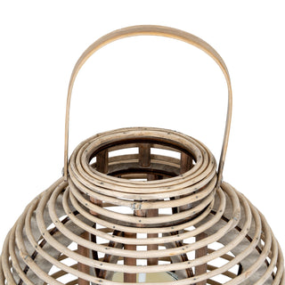 Close detail of the round willow lantern top, showing the woven rim and arched carrying handle.