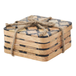 Stack of four square wood coasters with black geometric inlay pattern, bundled with rough brown rope.