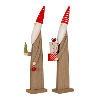 The wooden elf with the tree and bell shown next to a similar elf holding stacked gifts.