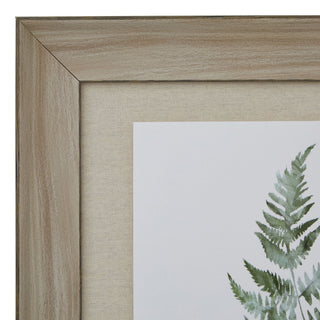 Close-up of the light wood frame corner and beige fabric mount texture.