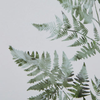 Close-up of the green watercolour fern print texture and detail against the light background.