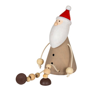 Wooden Santa decoration showing the red hat, painted face detail, and beaded legs with disc feet.