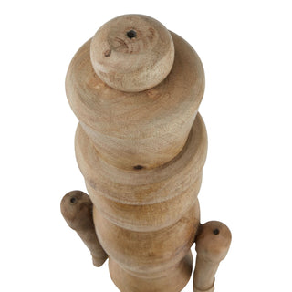 Close overhead shot showing the stacked, turned wooden head and torso, highlighting the natural grain.
