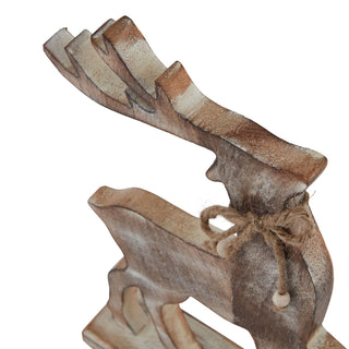 Close-up of the wooden reindeer's distressed finish, layered antlers, and twine neck tie detail.