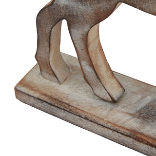 Detail shot of the wooden reindeer's layered legs and hooves resting on the distressed rectangular base.