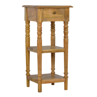 Narrow wooden table with turned legs, two storage shelves, and a single drawer featuring a small brass pull.
