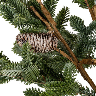 Detail shot showing the texture of the pinecone and the mixed green artificial pine needles.